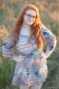 Curvy Redhead Cutie In Glasses Kaycee Shows Her Huge Tits In a Field